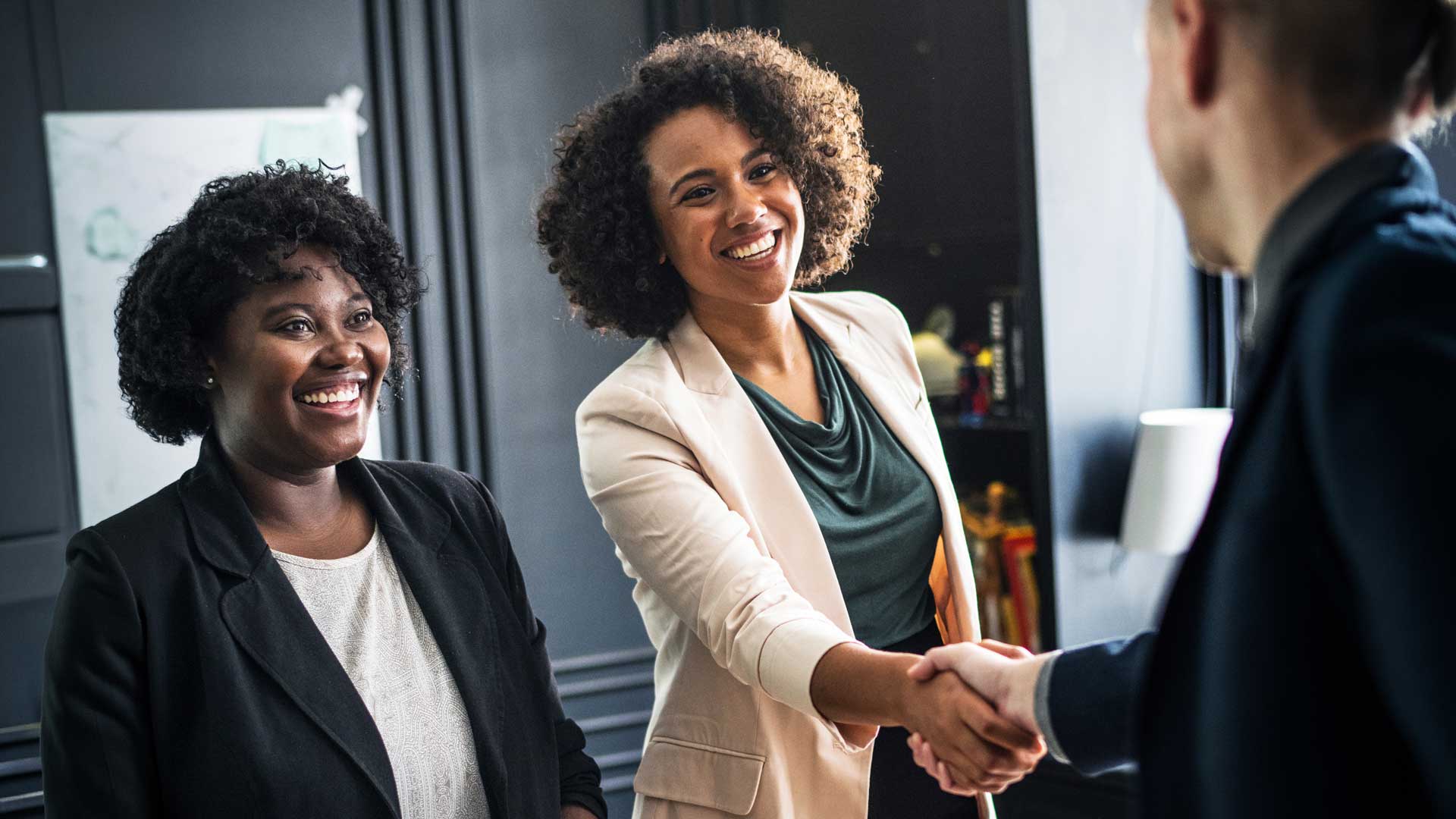 business meeting, handshake, the partner perspective, more confidence, fewer caveats